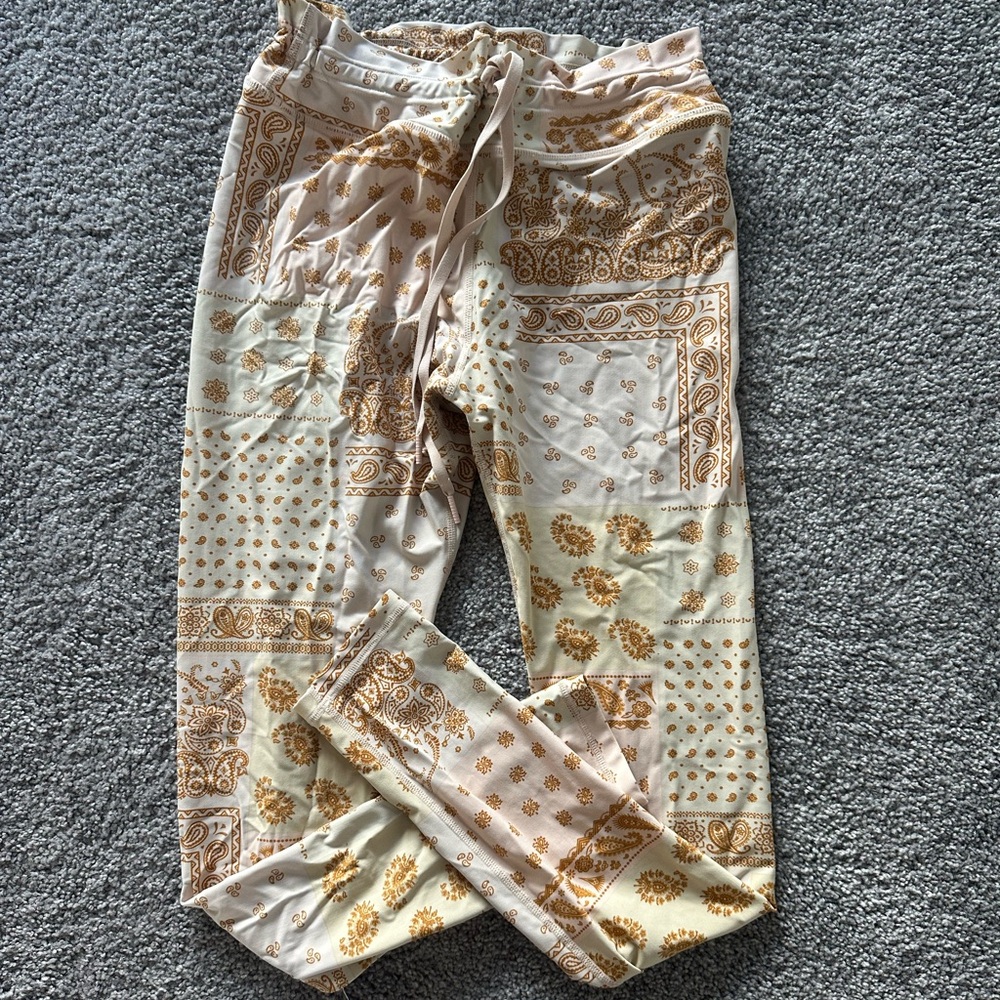 The Upside Floral Print Pants in Cream and Gold